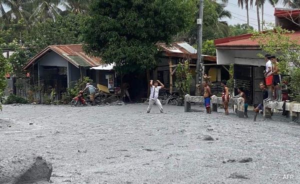 Pics: Volcano Erupts In Philippines, Debris Sweeps Through Village